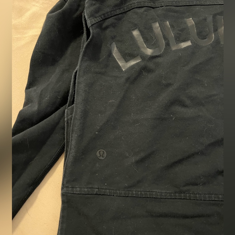 Lululemon black hoodie with slit sides! Size 6